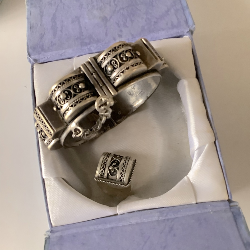 - Silver bracelet and ring